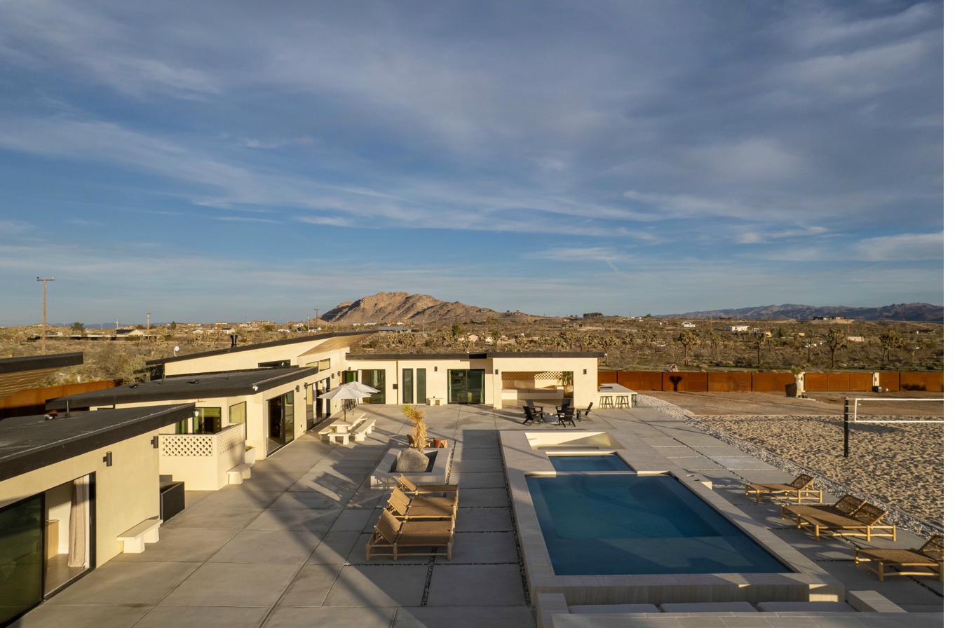 Elevated pool deck with desert mountain view